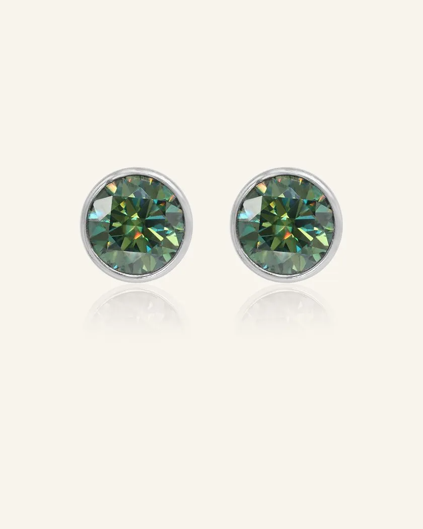 A pair of elegant earrings, each featuring a one carat green moissanite stone set in a bezel silver setting.