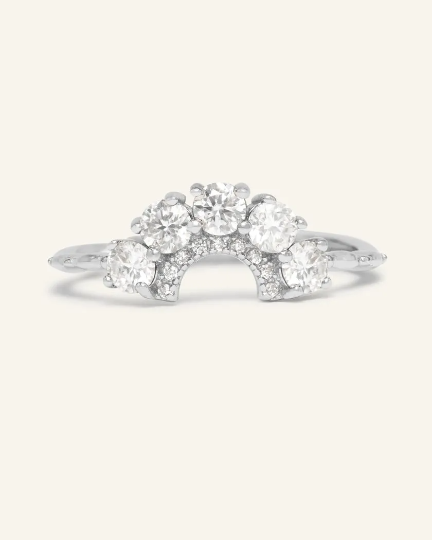 Arc White Moissanite Ring in silver featuring a delicate arc design set with brilliant white moissanite gemstones.
