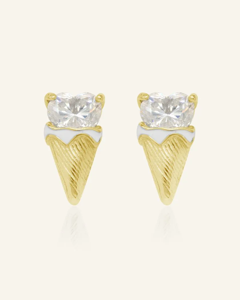 The Creamy Cone Moissanite Studs feature a heart-shaped white moissanite set in yellow gold, resembling a delightful ice cream treat. The hand-painted enamel detail on the cone adds a playful touch, making these studs a sweet statement piece.