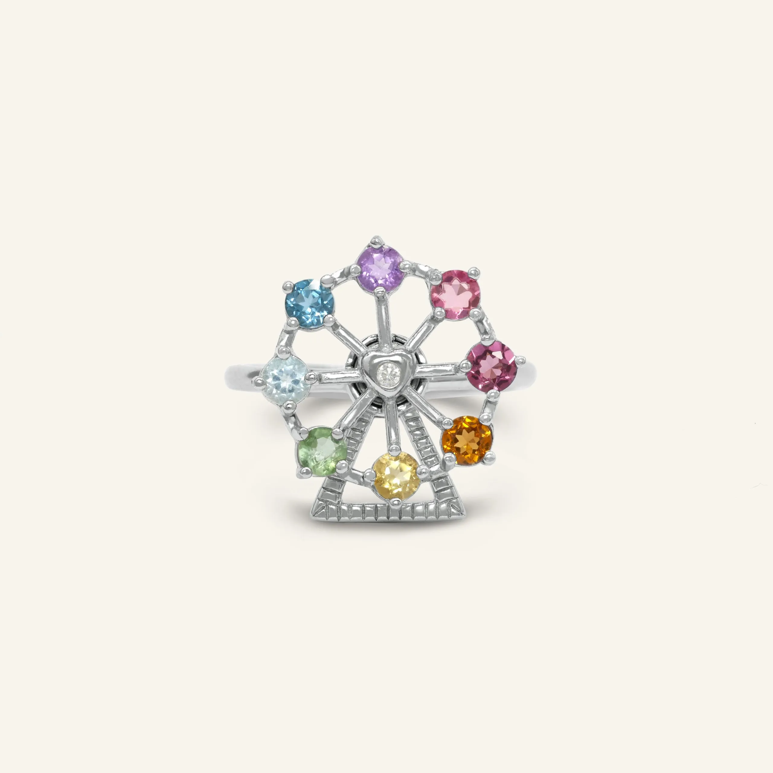 Ferris wheel-inspired ring featuring vibrant natural gemstones, handcrafted for a whimsical and elegant look.