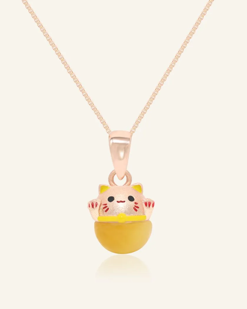 Fortune cat necklace featuring a charming rose gold cat pendant sitting atop a polished tiger eye stone, symbolizing luck and prosperity.
