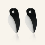 Penguin-shaped stud earrings crafted from polished agate, featuring a sparkling white moissanite eye.