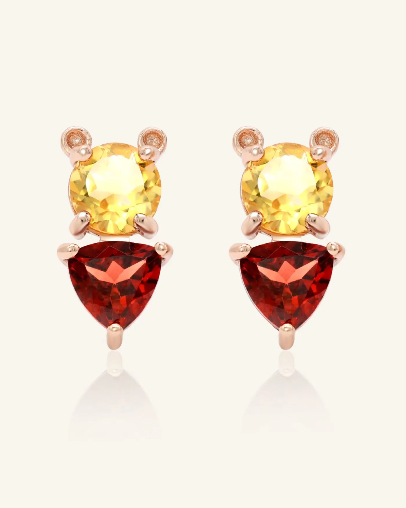 Pooh Origami Studs in rose gold, inspired by Winnie the Pooh, featuring a whimsical bear design with sparkling garnet and citrine gemstones.
