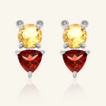 Pooh Origami Studs in silver, inspired by Winnie the Pooh, featuring a whimsical bear design with sparkling garnet and citrine gemstones.