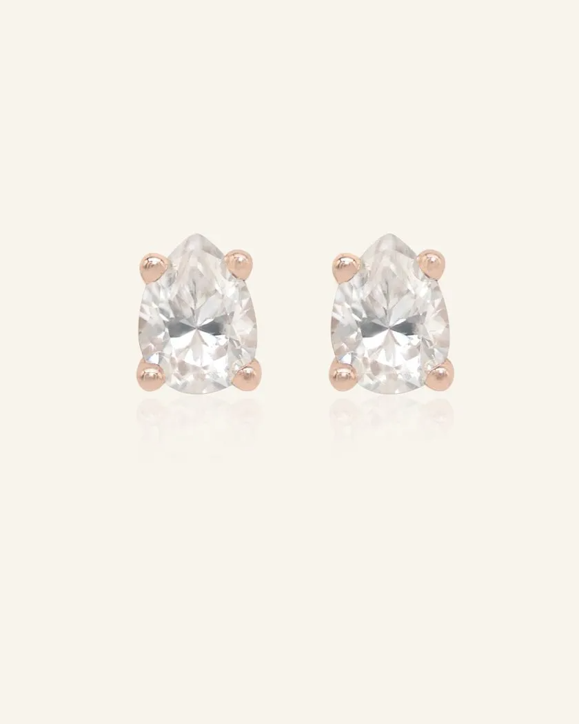 Elegant teardrop-shaped white moissanite stud earrings set in rose gold, showcasing a timeless and sparkling design.