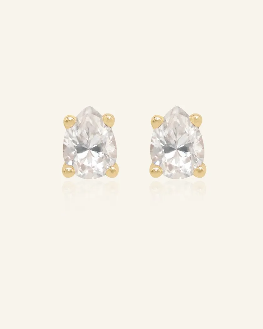 Elegant teardrop-shaped white moissanite stud earrings set in yellow gold, showcasing a timeless and sparkling design.