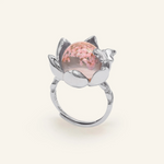 Close-up of a silver eternal bloom ring with sakura-like flowers