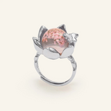 Close-up of a silver eternal bloom ring with sakura-like flowers