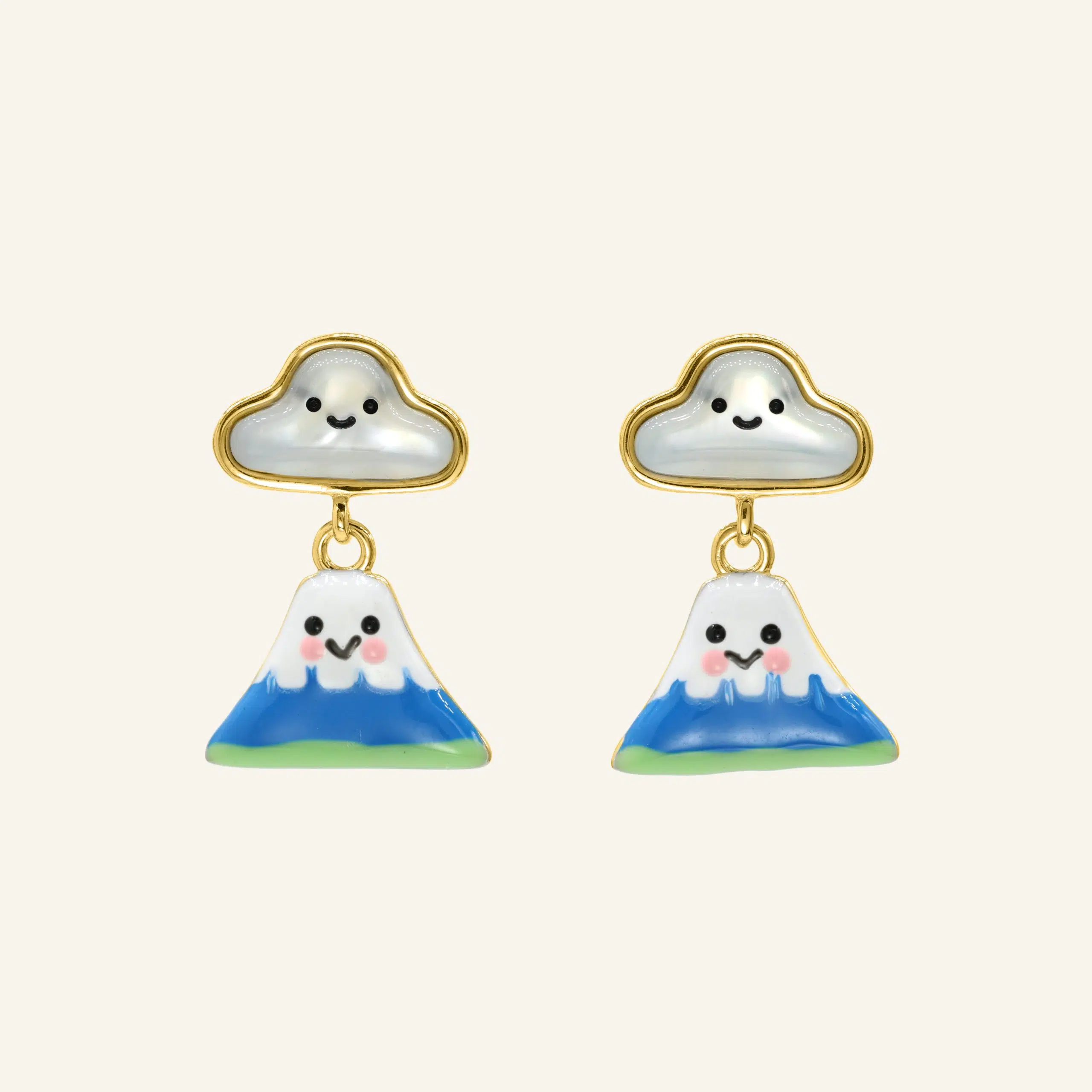 Close-up of a pair of yellow gold fuji-san cloud mother-of-pearl studs